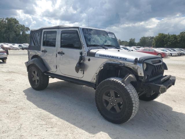 1C4BJWDG2GL189047 - 2016 JEEP WRANGLER U SPORT Silber Foto 4