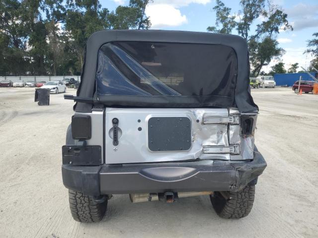 1C4BJWDG2GL189047 - 2016 JEEP WRANGLER U SPORT Silber Foto 6