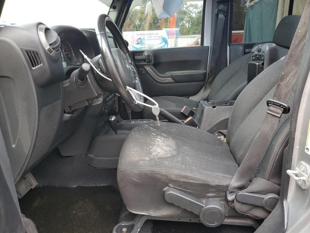 1C4BJWDG2GL189047 - 2016 JEEP WRANGLER U SPORT Silber Foto 7