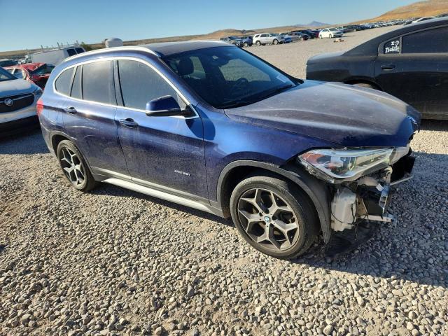 WBXHT3C34GP887589 - 2016 BMW X1 XDRIVE28I BLUE photo 4