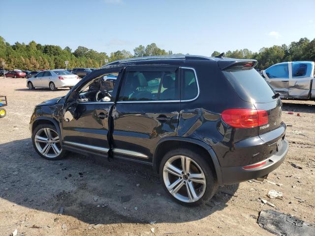 WVGBV3AX2EW101290 - 2014 VOLKSWAGEN TIGUAN S BLACK photo 2