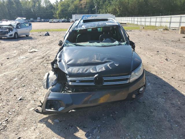 WVGBV3AX2EW101290 - 2014 VOLKSWAGEN TIGUAN S BLACK photo 5