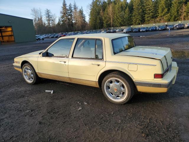 1G6KS5189HU802851 - 1987 CADILLAC SEVILLE YELLOW photo 2