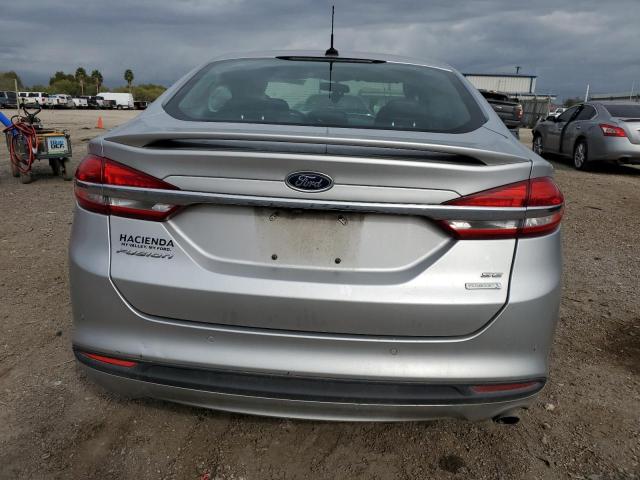 3FA6P0HD5JR267266 - 2018 FORD FUSION SE SILVER photo 6