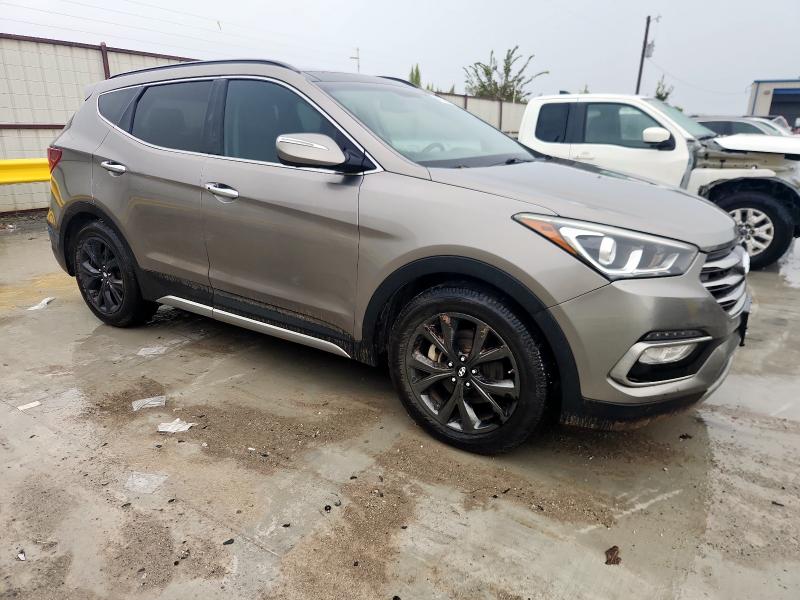 5XYZW4LA7HG388416 - 2017 HYUNDAI SANTA FE S GRAY photo 4