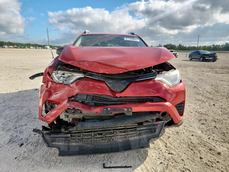 2T3ZFREV0GW291846 - 2016 TOYOTA RAV4 LE RED photo 5