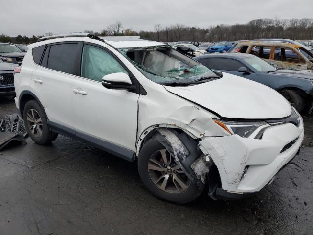 2T3WFREV6GW254853 - 2016 TOYOTA RAV4 XLE WHITE photo 4