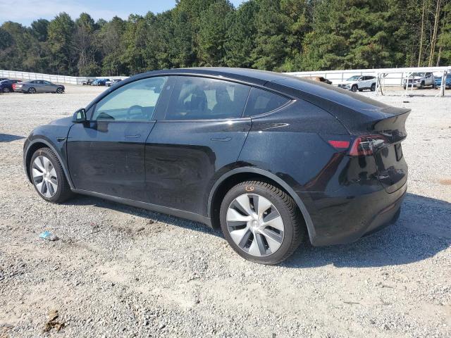 7SAYGDEE4PA143135 - 2023 TESLA MODEL Y Schwarz Foto 2