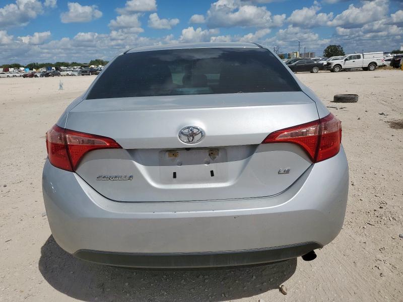 5YFBURHEXKP909471 - 2019 TOYOTA COROLLA L ვერცხლისფერი ფოტო 6