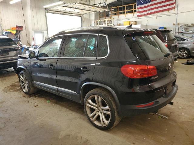 WVGBV7AX4CW539183 - 2012 VOLKSWAGEN TIGUAN S შავი ფოტო 2