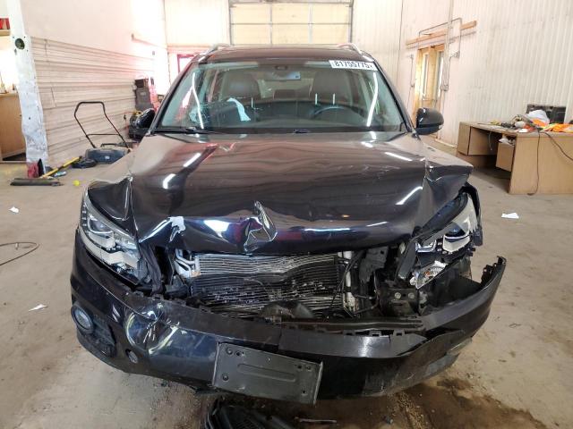 WVGBV7AX4CW539183 - 2012 VOLKSWAGEN TIGUAN S შავი ფოტო 5