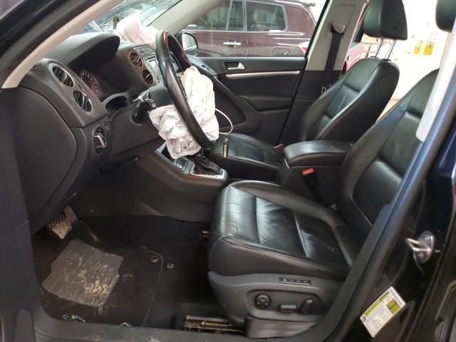 WVGBV7AX4CW539183 - 2012 VOLKSWAGEN TIGUAN S შავი ფოტო 7