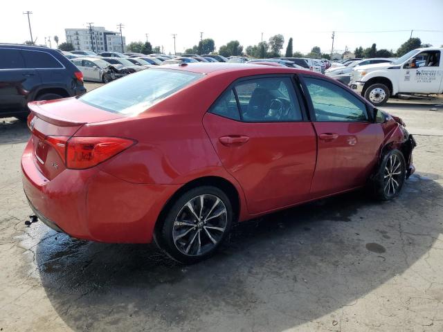 5YFBURHE8JP776787 - 2018 TOYOTA COROLLA L წითელი ფოტო 3