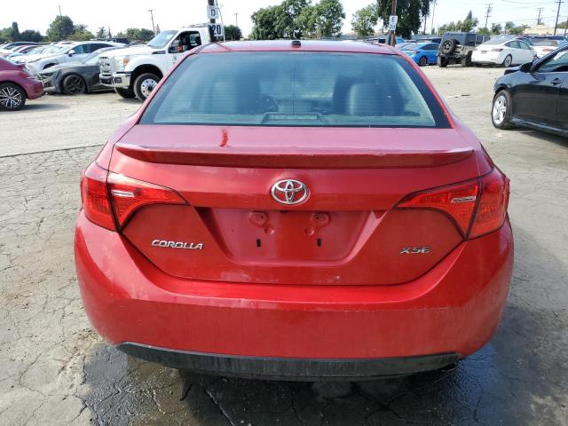 5YFBURHE8JP776787 - 2018 TOYOTA COROLLA L წითელი ფოტო 6