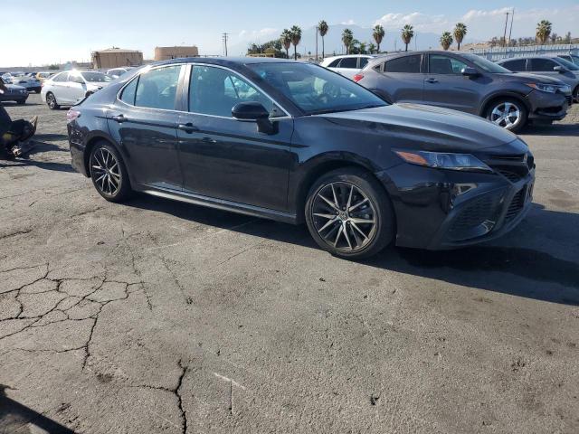 4T1T11AK9RU891682 - 2024 TOYOTA CAMRY SE NIGHT SHADE BLACK photo 4