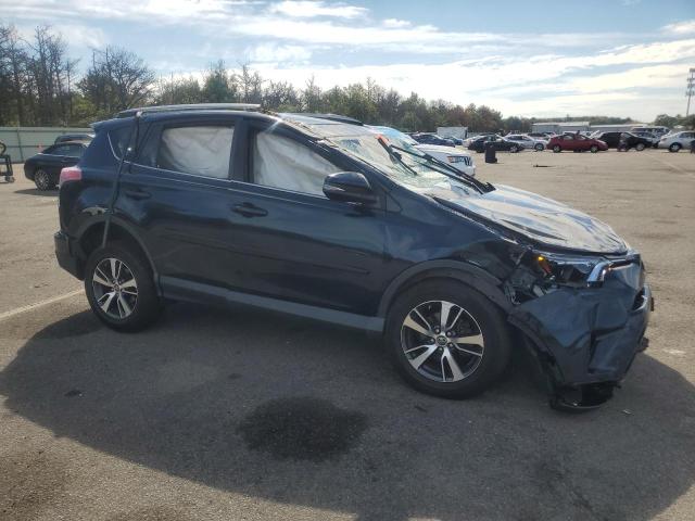 JTMRFREV5HD210578 - 2017 TOYOTA RAV4 XLE BLUE photo 4