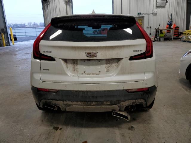 1GYFZBR48PF179634 - 2023 CADILLAC XT4 LUXURY WHITE photo 6