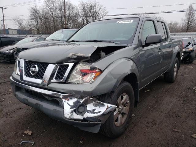 1N6AD07W09C425522 - 2009 NISSAN FRONTIER CREW CAB SE GRAY photo 1