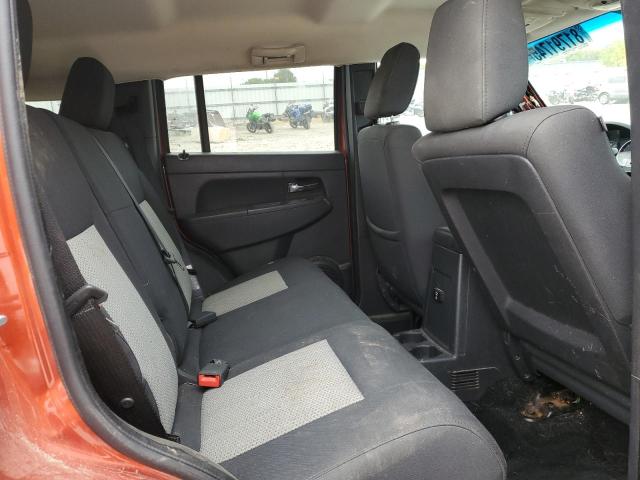 1J8GN28K69W519493 - 2009 JEEP LIBERTY SPORT ORANGE photo 10