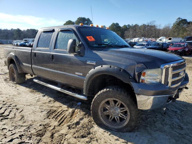 1FTWW31P55ED13559 - 2005 FORD F350 SRW SUPER DUTY GRAY photo 4