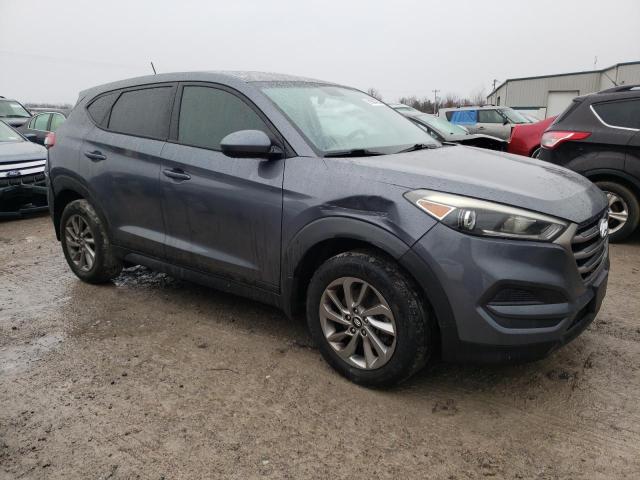 KM8J23A43GU186424 - 2016 HYUNDAI TUCSON SE GRAY photo 4