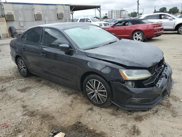 3VWDB7AJXJM257495 - 2018 VOLKSWAGEN JETTA SE BLACK photo 4
