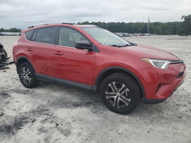 JTMZFREV7GJ075040 - 2016 TOYOTA RAV4 LE RED photo 4