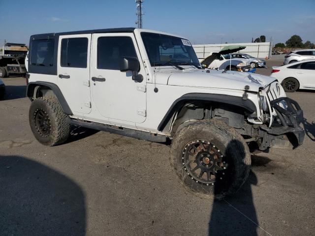 1C4HJWDG4EL316582 - 2014 JEEP WRANGLER U SPORT WHITE photo 4