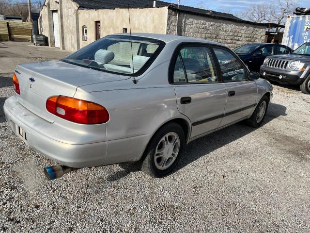 1Y1SK528XYZ411220 - 2000 CHEVROLET GEO PRIZM BASE SILVER photo 4