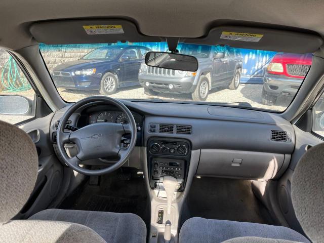 1Y1SK528XYZ411220 - 2000 CHEVROLET GEO PRIZM BASE SILVER photo 9