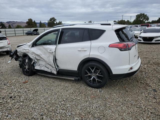 JTMNFREV1GD083292 - 2016 TOYOTA RAV4 SE WHITE photo 2