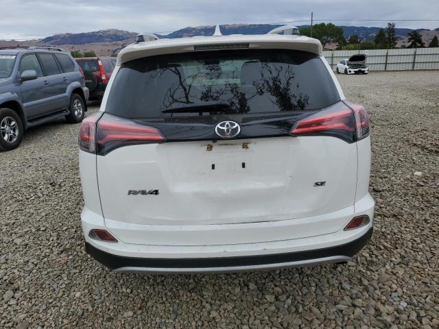 JTMNFREV1GD083292 - 2016 TOYOTA RAV4 SE WHITE photo 6