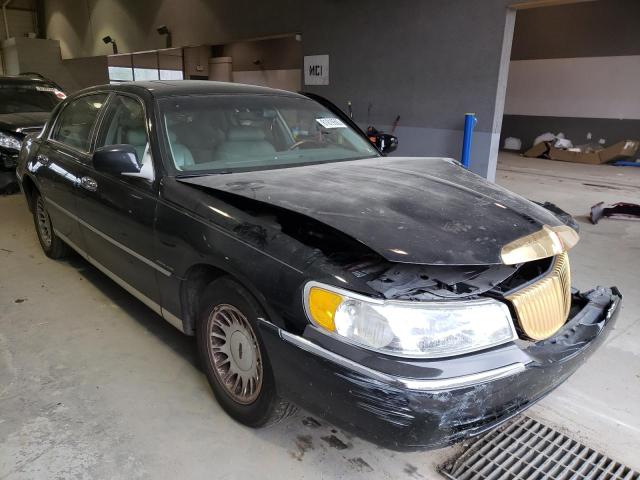 1LNHM83W5YY935870 - 2000 LINCOLN TOWN CARTIER BLACK photo 4