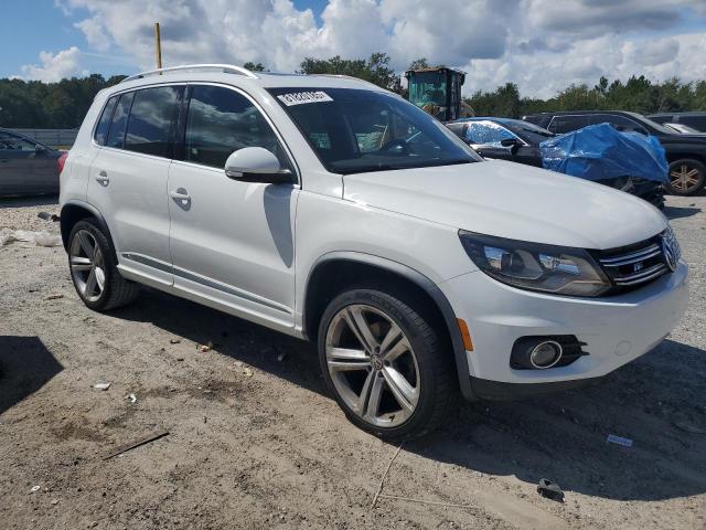 WVGAV3AXXEW096173 - 2014 VOLKSWAGEN TIGUAN S WHITE photo 4