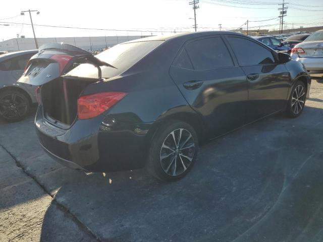 2T1BURHE1KC165291 - 2019 TOYOTA COROLLA L Blau Foto 3