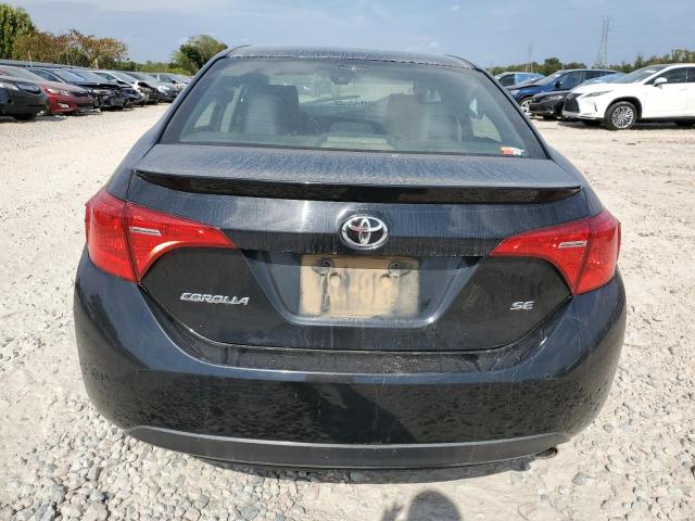 5YFBURHE9HP652828 - 2017 TOYOTA COROLLA L BLACK photo 6