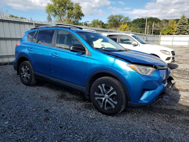 JTMBFREV9HJ709001 - 2017 TOYOTA RAV4 LE BLUE photo 4
