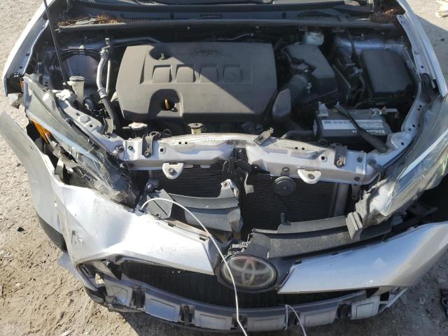 5YFBURHEXKP937612 - 2019 TOYOTA COROLLA L Argent photo 11