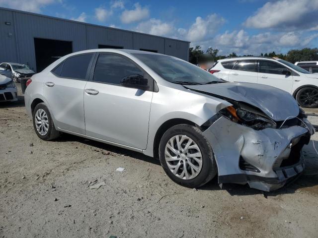 5YFBURHEXKP937612 - 2019 TOYOTA COROLLA L Argent photo 4