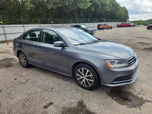 3VWDB7AJ2HM382372 - 2017 VOLKSWAGEN JETTA SE GRAY photo 4