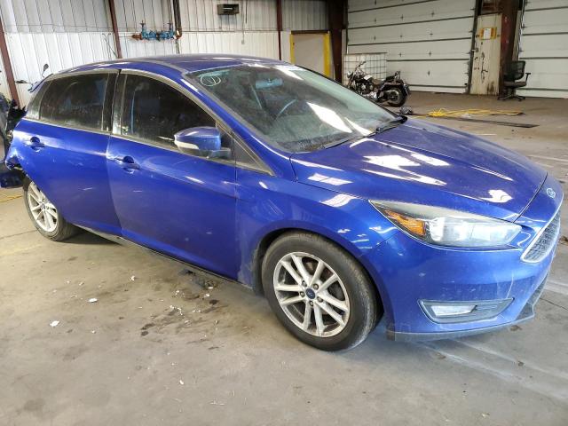 1FADP3K28FL218259 - 2015 FORD FOCUS SE BLUE photo 4