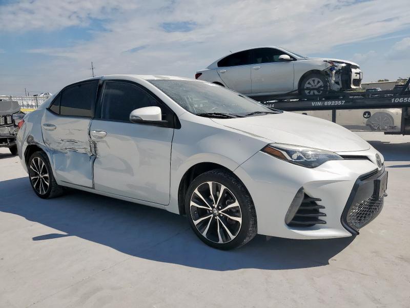 5YFBURHE6HP583922 - 2017 TOYOTA COROLLA L WHITE photo 4