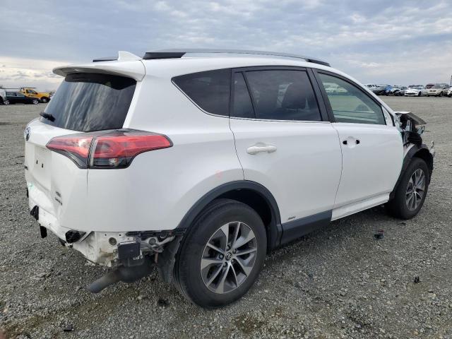 JTMRJREV0JD242567 - 2018 TOYOTA RAV4 HV LE WHITE photo 3