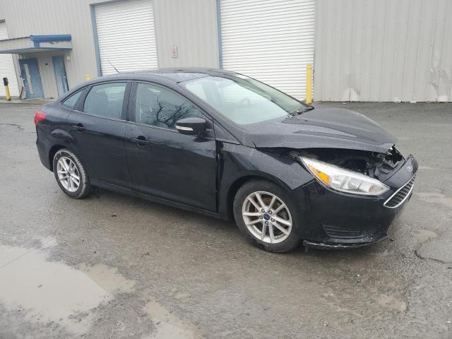 1FADP3F21HL281183 - 2017 FORD FOCUS SE BLACK photo 4