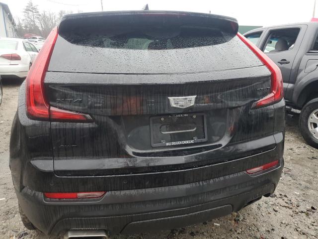 1GYFZBR4XPF127552 - 2023 CADILLAC XT4 LUXURY BLACK photo 6