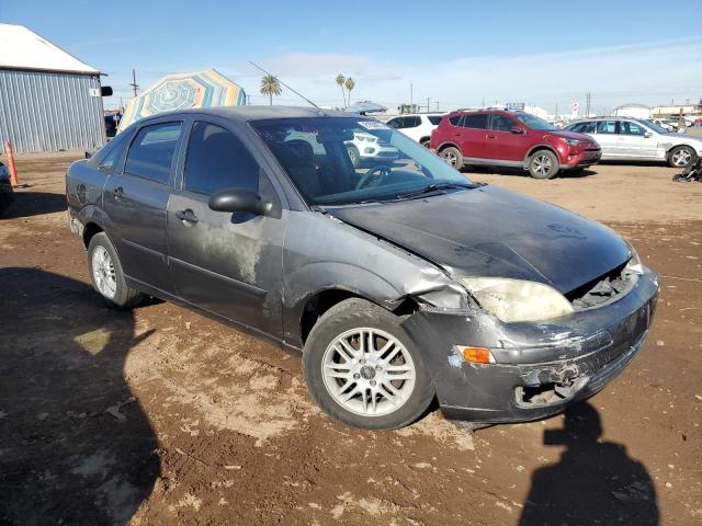 1FAFP34N46W112339 - 2006 FORD FOCUS ZX4 GRAY photo 4