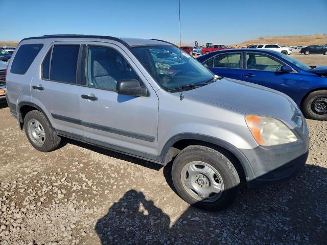 JHLRD78533C030913 - 2003 HONDA CR-V LX SILVER photo 4