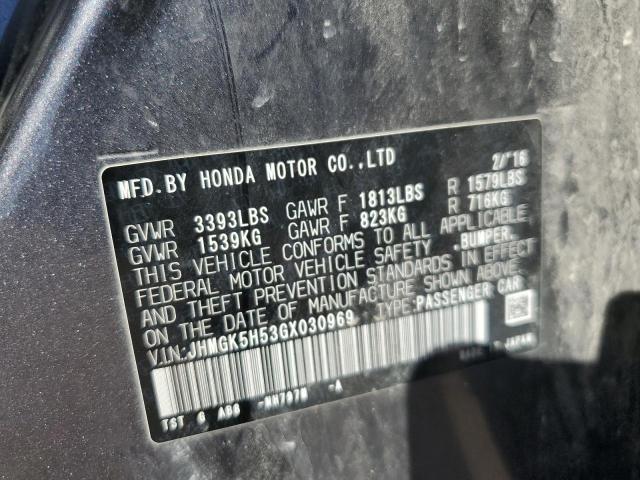 JHMGK5H53GX030969 - 2016 HONDA FIT LX GRAY photo 12