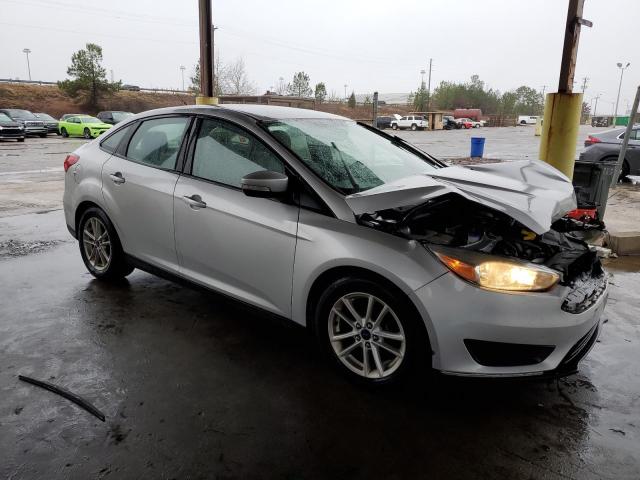 1FADP3F20FL226494 - 2015 FORD FOCUS SE GRAY photo 4