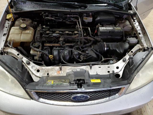 1FAHP34N26W149656 - 2006 FORD FOCUS ZX4 SILVER photo 11